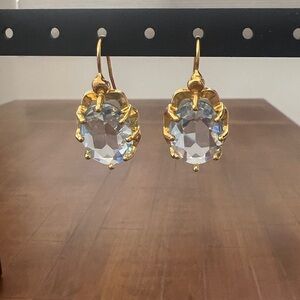 BEAUTIFUL AQUAMARINE COLORED STONE IN COLORED SETTING.